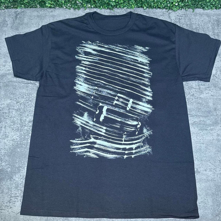 Black short-sleeve tee with a large distressed white horizontal brushstroke graphic