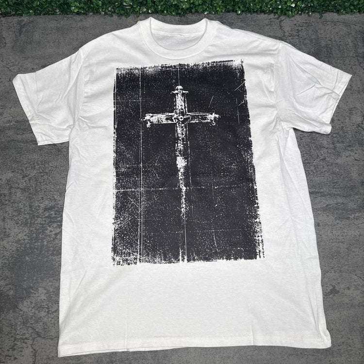 White tee with an ornate cross inside a distressed black rectangular print