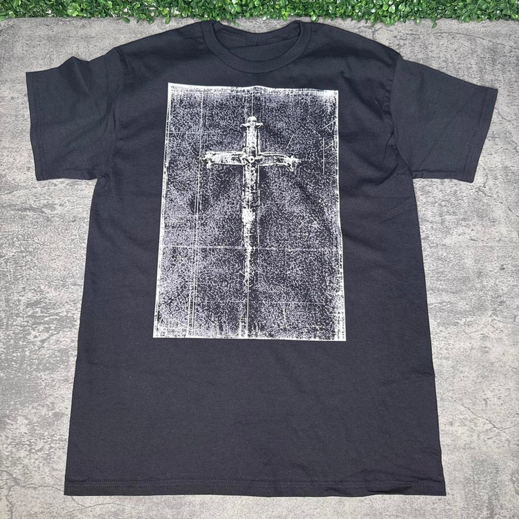 Black short-sleeve tee with a white cross in a distressed rectangular panel