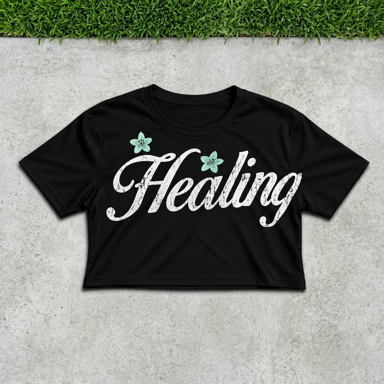 Healing script crop flat lay on concrete with grass above