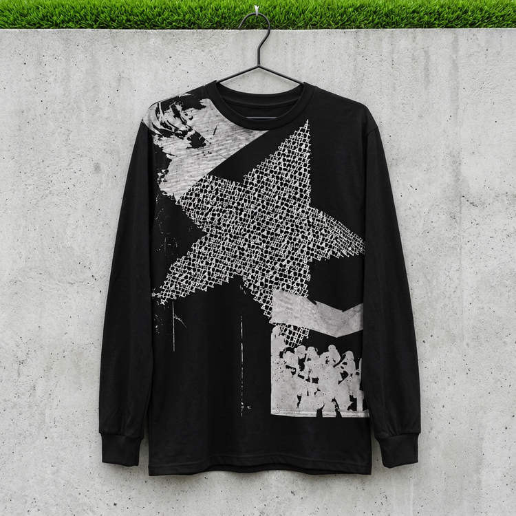 Black star collage long sleeve on a hanger against concrete with grass above