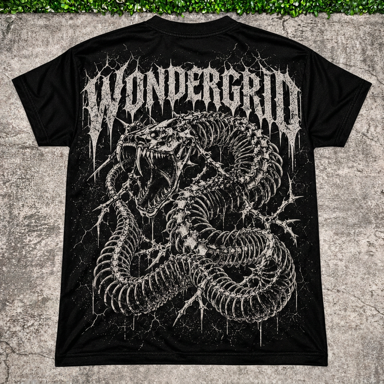 Serpent Bones Tee main photo with AI-edited concrete and greenery backdrop