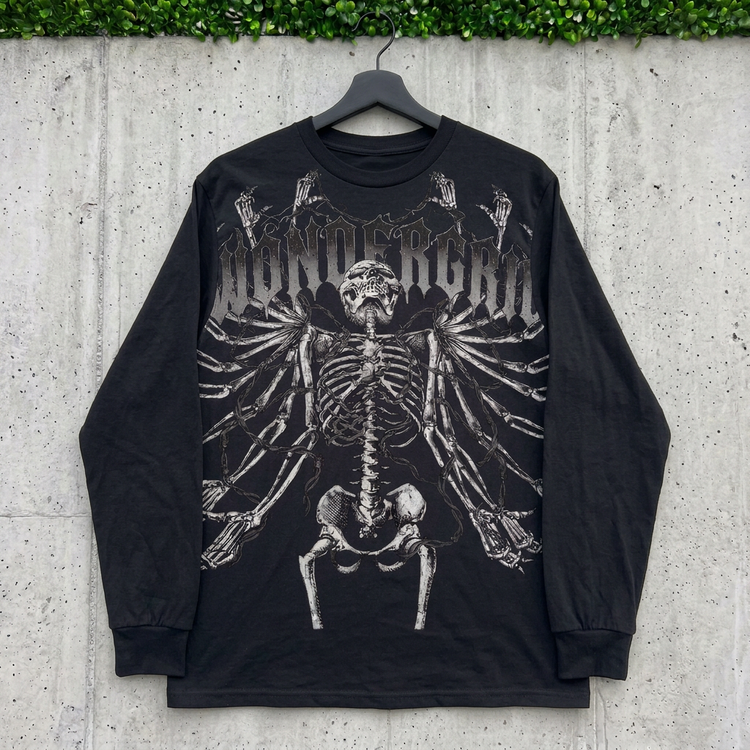 Black Bonebound Skeleton long sleeve on a hanger against concrete