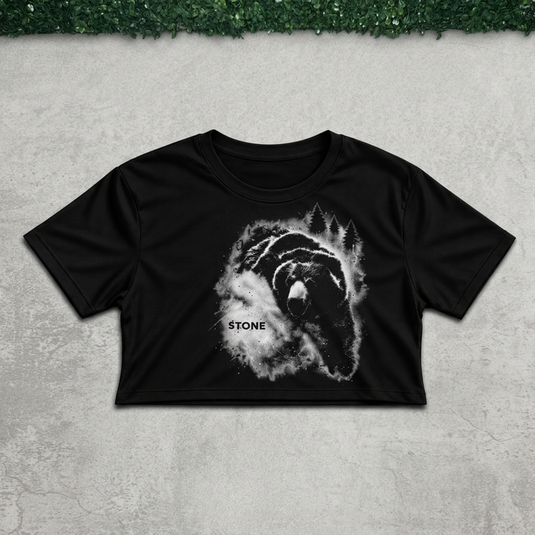 Forest bear crop flat lay on concrete with grass above