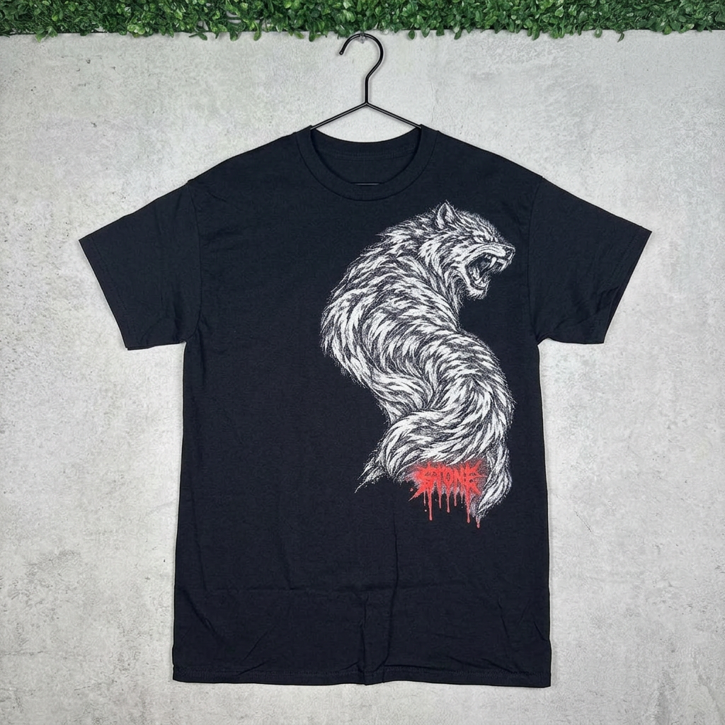 STONE Desert Decides tee on a hanger against concrete with grass above