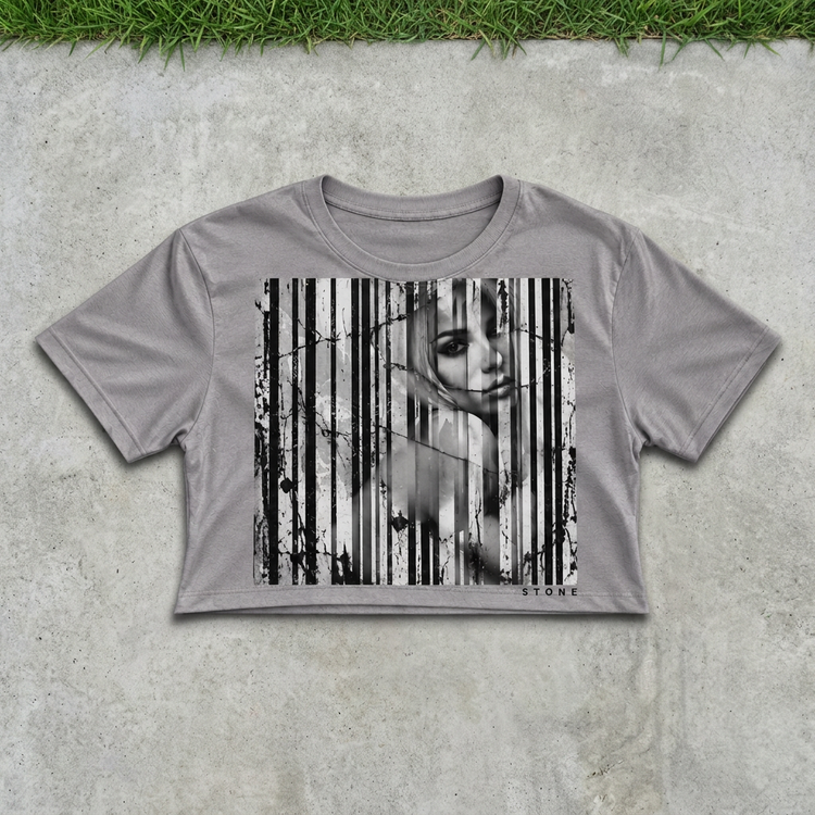 Gray barcode portrait crop flat lay on concrete with grass above