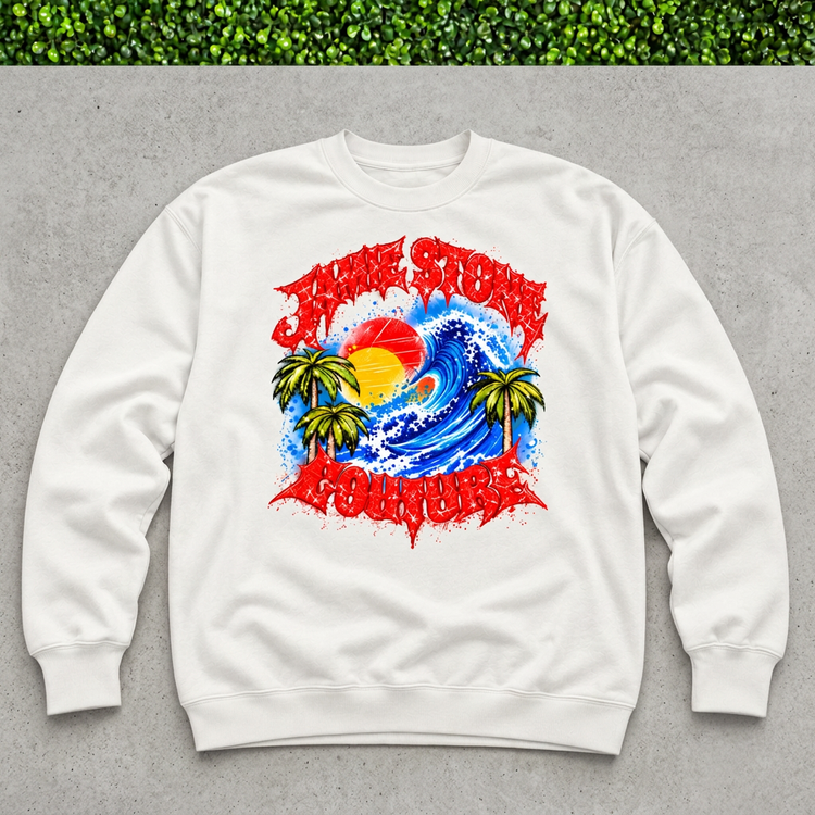 White Jamie Stone Couture wave sweatshirt on concrete with thin green grass strip