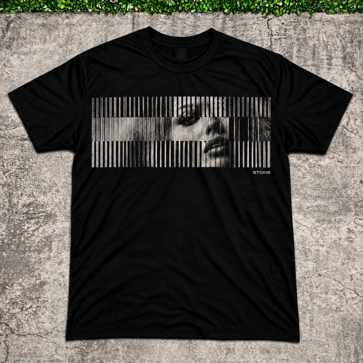 STONE Barcode Face Tee main photo with AI-edited concrete and greenery backdrop