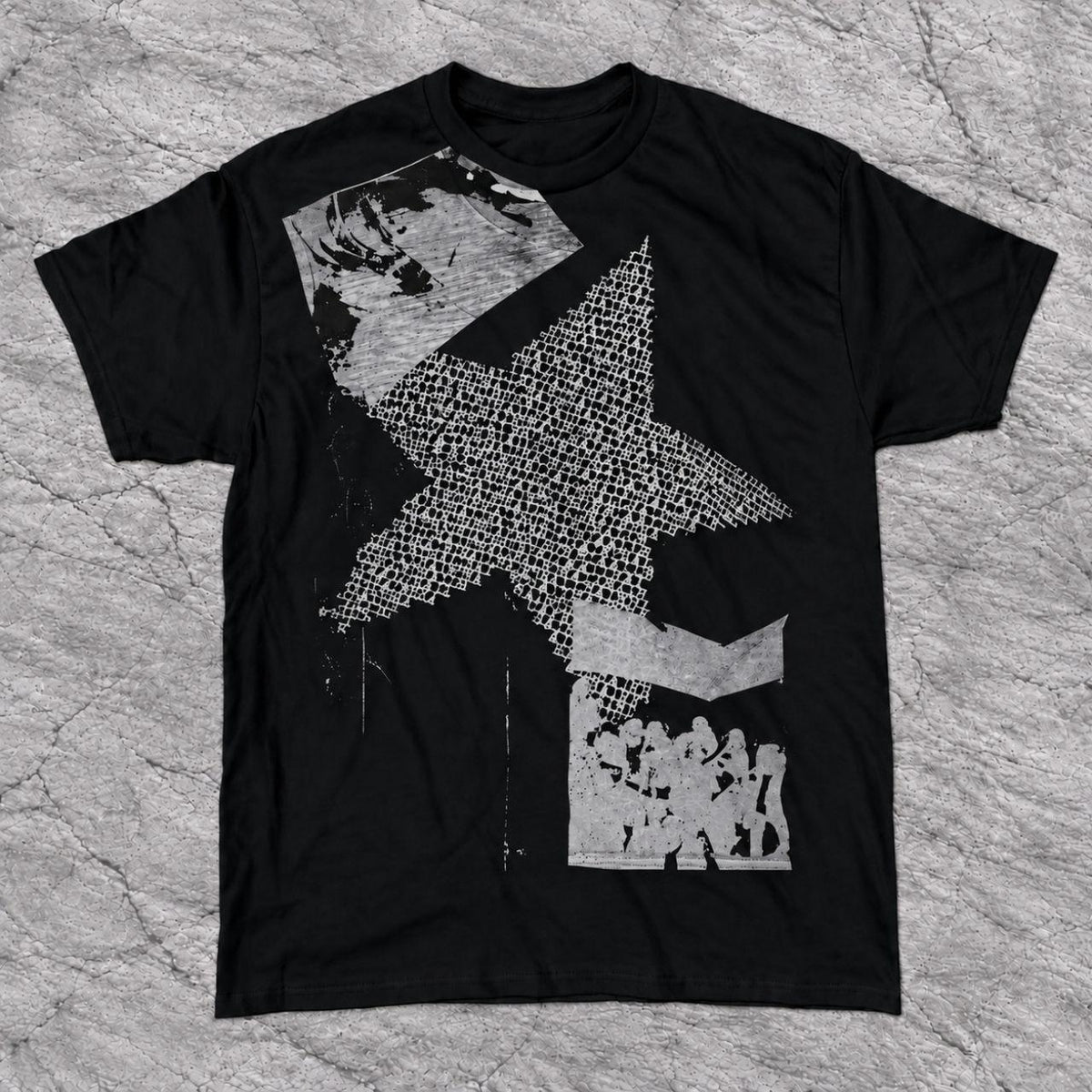 Black tee featuring a large gray textured star and angular monochrome collage panels